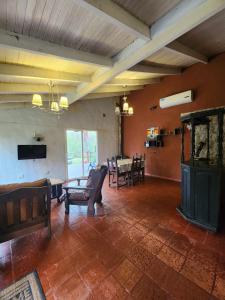a living room with a couch and a table at nisueñes in Belén de Escobar