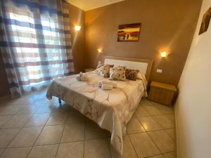 a bedroom with a bed in a room at Villa Sofia in Parghelia