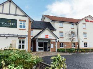 a hotel with the front of the building at ibis Coleraine Riverside in Coleraine