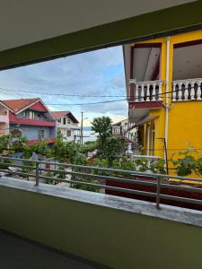 a view of a city from a balcony at Green House in Pogradec +4 photos
