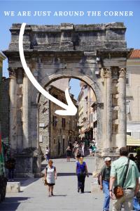 a sign that says we are just around the corner at TT Apartmani - Historic Center Pula in Pula