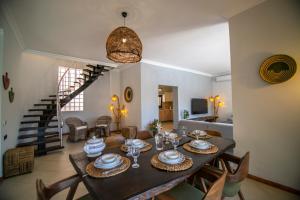 a dining room with a table and chairs at Villa Stone Bodrum - Private Pool & Garden in Bodrum City