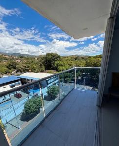 a balcony of a house with a view at Luxury Suite with Pool in Melgar in Melgar