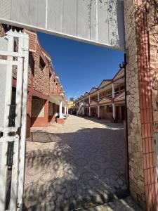 an empty street in an old building at complejo laprida in Santa Lucía +4 photos
