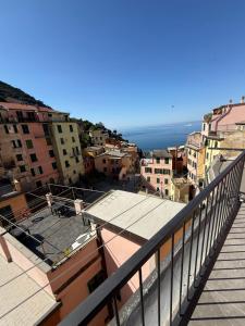 a view of a city from a balcony at CAST AWAY in Riomaggiore +20 photos