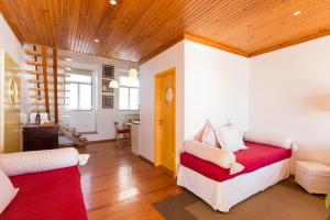 Ένα ή περισσότερα κρεβάτια σε δωμάτιο στο Casa d'Arriba