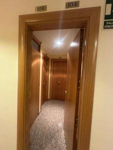 an open door to a hallway in a building at Hermida Rural in Eirejalba