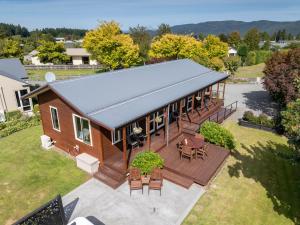 an overhead view of a house with a deck at Blue Ridge Studios and Bed & Breakfast in Te Anau