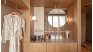 a bathroom with a sink and a mirror at Hotel Marvell Byron Bay in Byron Bay +9 photos