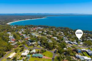 an aerial view of a campground next to a lake at Aqua Breeze by Experience Jervis Bay in Vincentia +7 photos