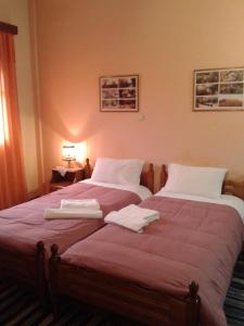 A bed or beds in a room at Zephyros