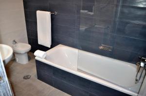 Kúpeľňa v ubytovaní Hotel Celanova