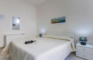 B&B Isole Dello Stagnone客房内的一张或多张床位