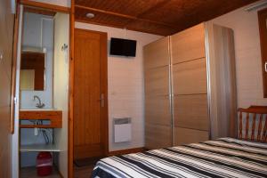 Ein Bett oder Betten in einem Zimmer der Unterkunft Résidence Les Hauts de Marquay