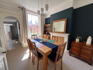 a dining room with a table and chairs at Number 29 in Melcombe Regis +28 photos