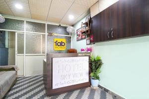 a room with a sign that says hotel stay well at FabHotel Skyview in Bhopal