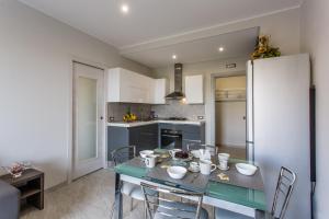 A kitchen or kitchenette at Versilia Residence