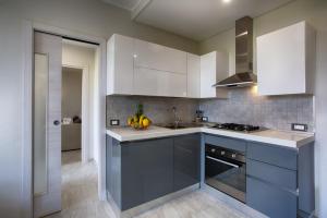 A kitchen or kitchenette at Versilia Residence