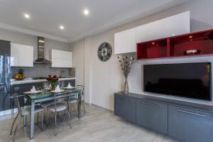 A kitchen or kitchenette at Versilia Residence
