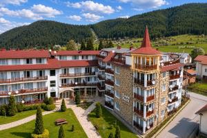 an aerial view of a hotel with mountains in the background at Panoramic Cozy Apartment in Beli Iskar