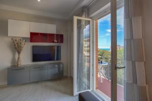 A kitchen or kitchenette at Versilia Residence