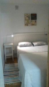 Posteľ alebo postele v izbe v ubytovaní Apartment Aloha Sitges