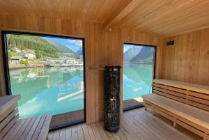 a sauna with a view of a body of water at Meiriet1936 in Fjarland
