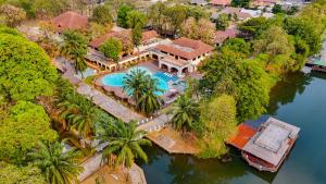 an aerial view of a house with a swimming pool at Pung-Waan Resort & Spa in Kanchanaburi City