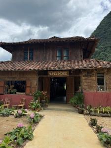 a building with a sign that reads king noco at Nùng Indigo in Cao Bằng +18 photos