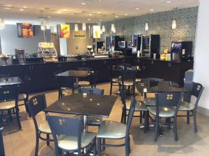 A restaurant or other place to eat at Days Inn & Suites by Wyndham Bonita Springs North Naples