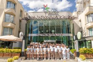 a group of people standing in front of a building at Alan Suites in Edirne +81 photos