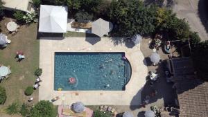 an overhead view of a swimming pool with people in it at comfortable studio in Grasse +3 photos