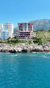a view of a city from the water at Luka private beach in Dobra Voda