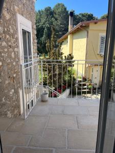 a view from a window of a house with a gate at Il Borghetto in Palinuro
