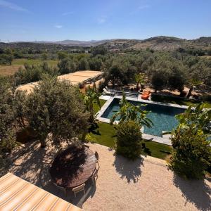 an aerial view of a villa with a swimming pool at Alaçatı Beka House in Alaçatı
