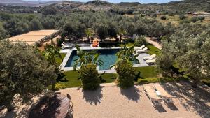 an aerial view of a villa with a swimming pool at Alaçatı Beka House in Alaçatı