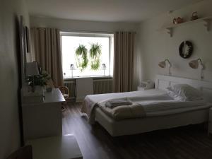 Postel nebo postele na pokoji v ubytování Wramsta B&B
