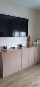 a white counter with two bowls on top of it at Шанс in Velingrad