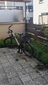 a bike is parked next to a building at Ferienwohnung Neckarsulm Mitte in Neckarsulm