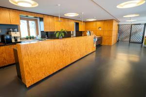 an office with a reception desk and a counter at Jugendherberge Ravensburg in Ravensburg