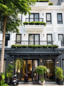 a rendering of the front of a building at AMA Residences in Buon Ma Thuot