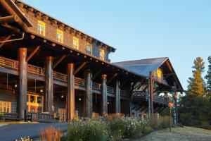 a large wooden building with a large roof at Glacier Park Lodge in East Glacier Park