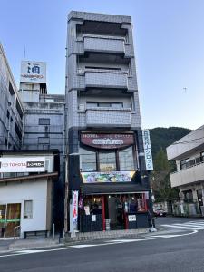 a building on the side of a street at Nikko Park Lodge Tobu Station in Nikko