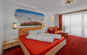a bedroom with a bed and a living room at Hotel Restaurant Rosmarie in Pfelders +159 photos
