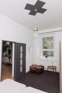 a living room with a black door and a table at ArtHause in Gubin