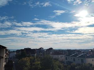 a view of a city under a cloudy sky at Adagio Sarafovo in Burgas