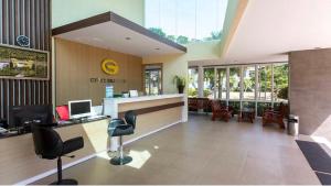 an office with a desk and chairs in a room at Gypsy Sea View Resort- Phi Phi Island in Phi Phi Islands