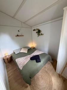 a bedroom with a large bed in a room at Charmant chalet près d Albi et des vignobles in Rivières +20 photos