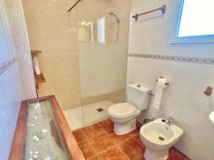 a bathroom with a toilet and a shower at Spanish Connection - Las Amoladeras in Cabo de Palos