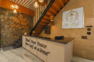 a restaurant with a sign that reads find your peace and rest at anytime at The Leaf in Ludhiana